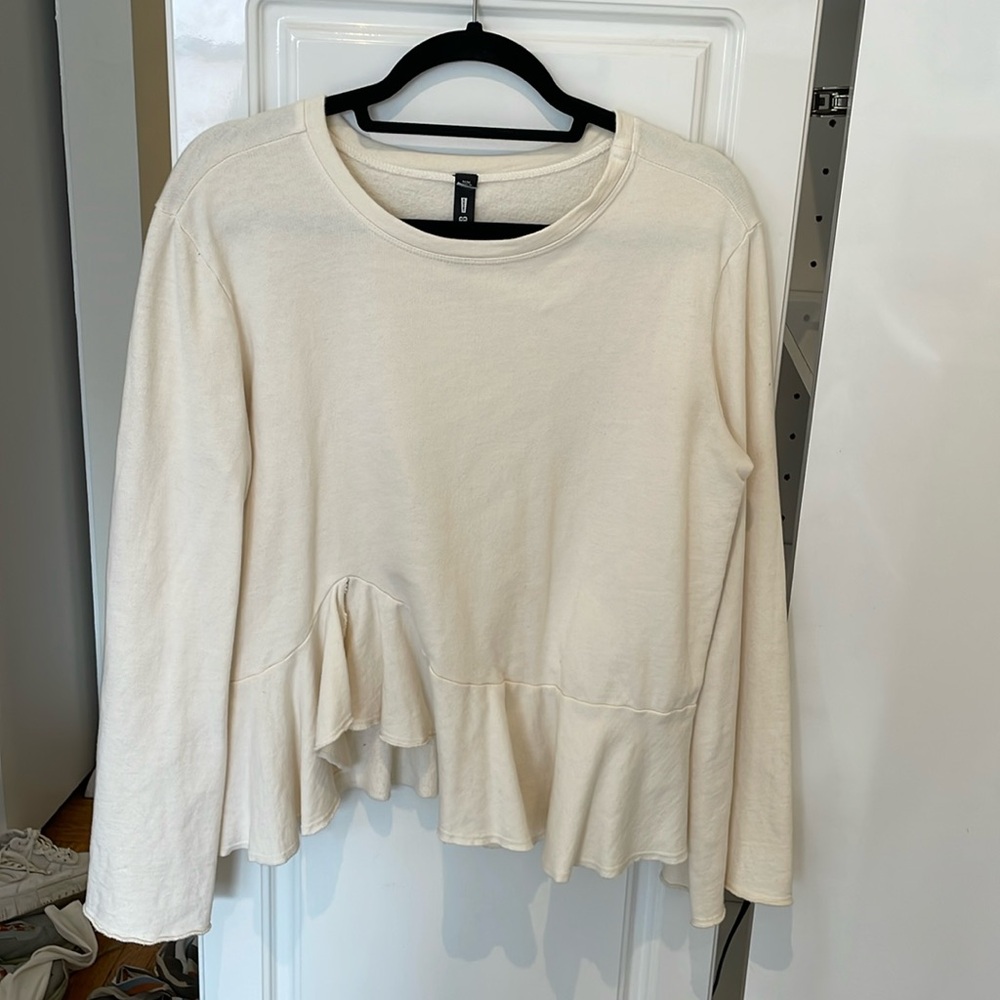 Flowy Cream Sweater. Comfy, sweatshirt-like material.